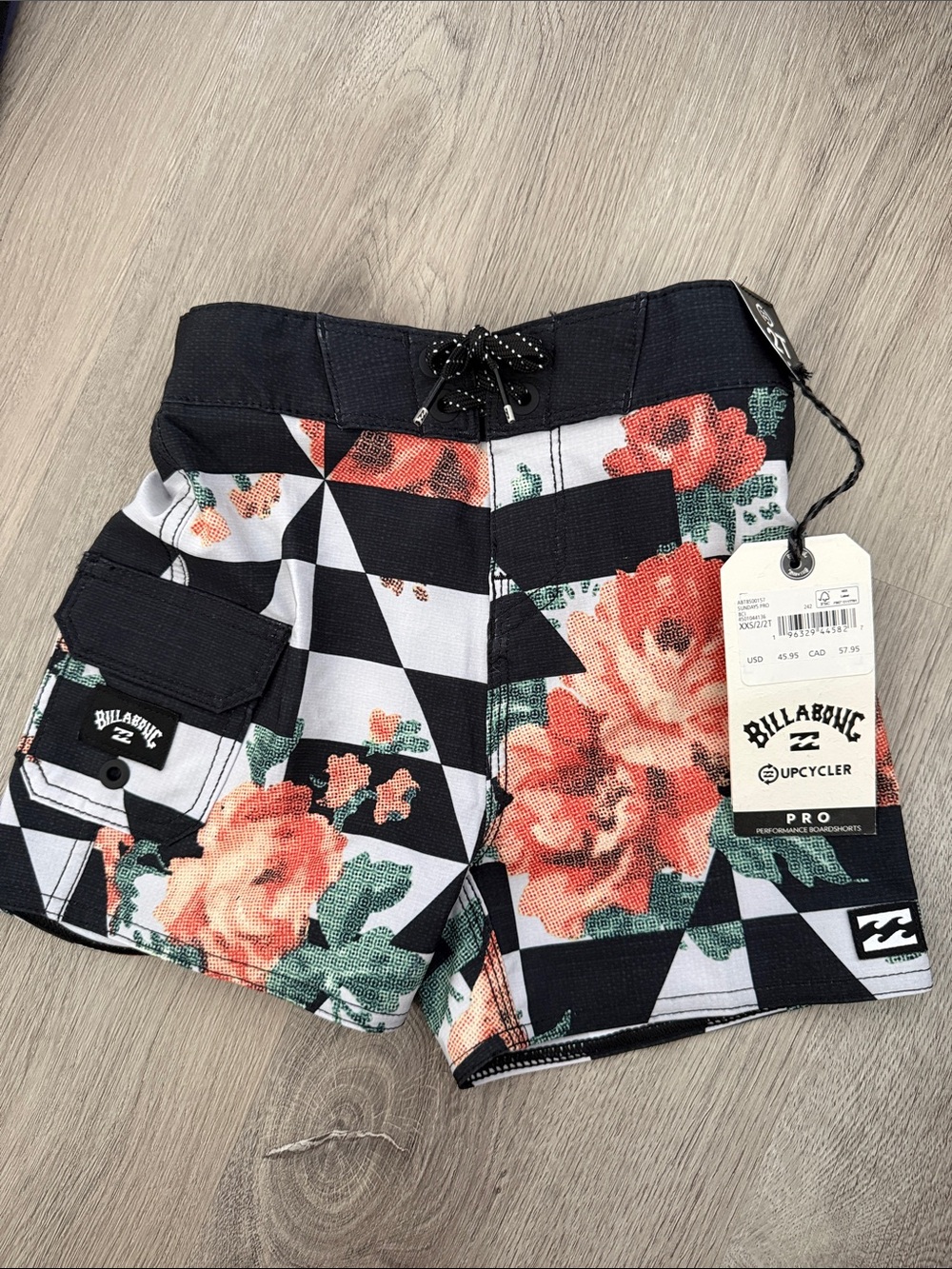 Boys Billabong Black & White Checkerboard Swim Shorts with Coral Floral Print